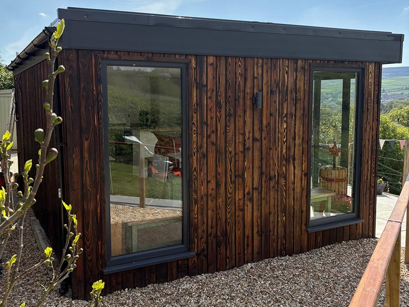 Garden room side profile with Whiskey Charred timber cladding
